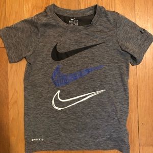 Nike dri-fit shirt kids size M (5-6y) gray with large swooshes